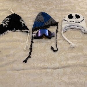 ski bundle which includes 3 ski hats and childs ski goggles